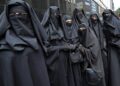 Sri Lanka to ban burqas and shut Islamic schools for 'national security' Switzerland approves ban on Niqabs and Burqas in public