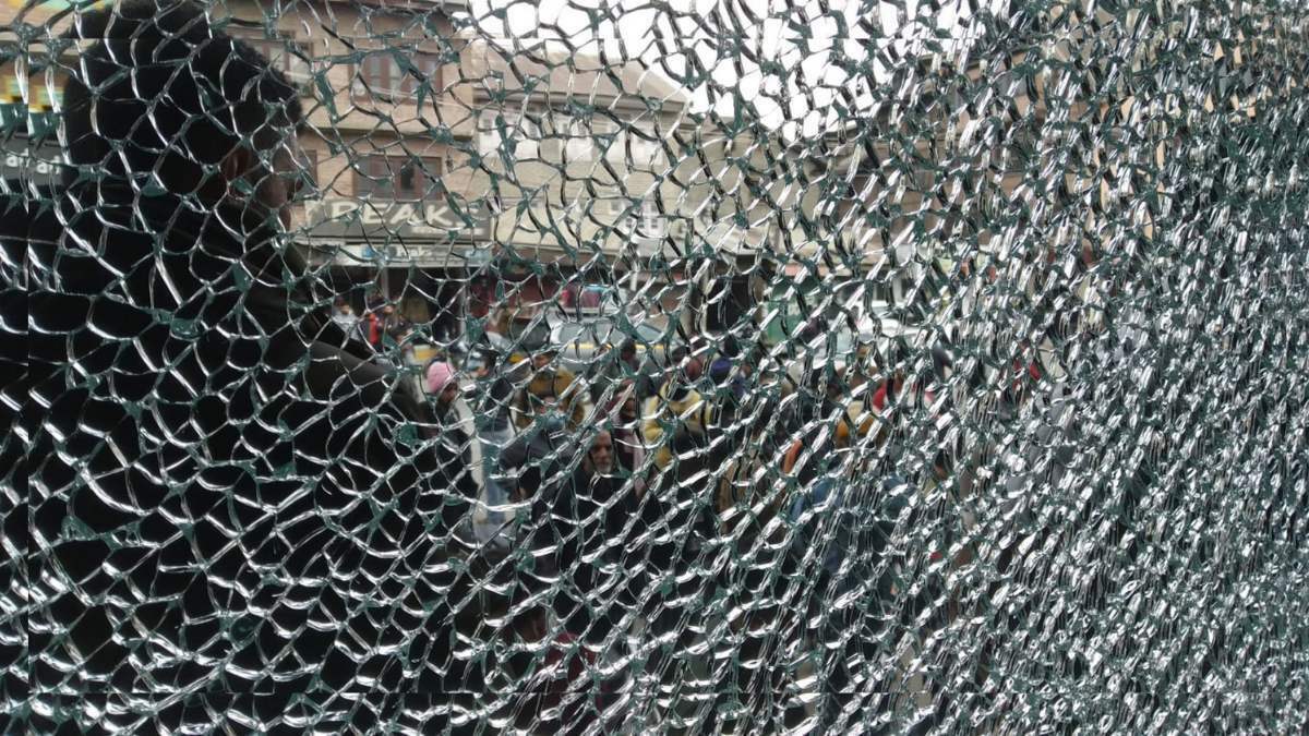 Window dressing of 3 shops damaged in Khawaja Bazar grenade explosion Window dressing of 3 shops damaged in Khawaja Bazar grenade explosion